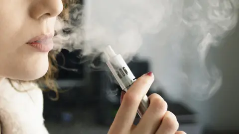 Getty Images Woman vaping