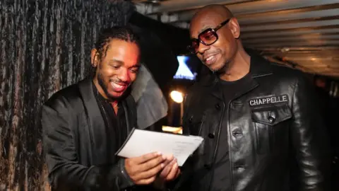 Getty Images Kendrick Lamar with Dave Chappelle