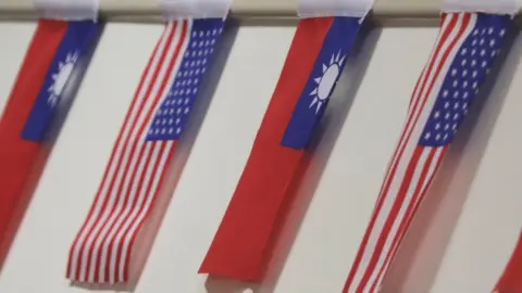 EPA The flags of Taiwan and USA are on display during the ceremonial opening of the "Taiwan Council for US Affairs" office in Taipei,