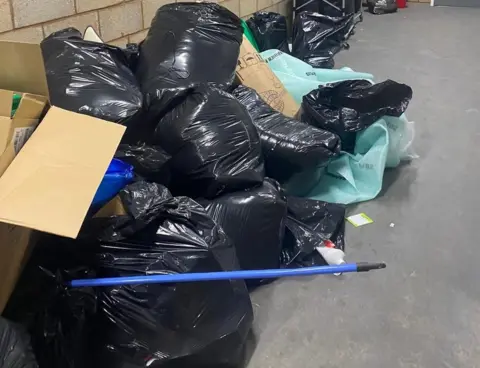 Holly Mullins Piles of students' items