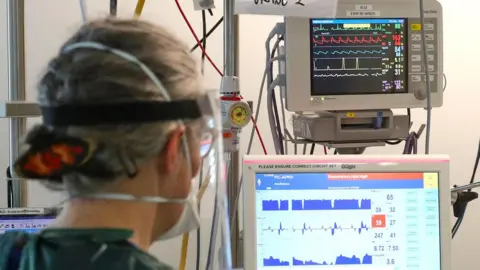 AFP/Getty Intensive care medical staff