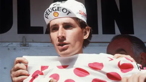 STR Robert Millar poses with the King of the Mountains jersey at the Tour De France in 1984