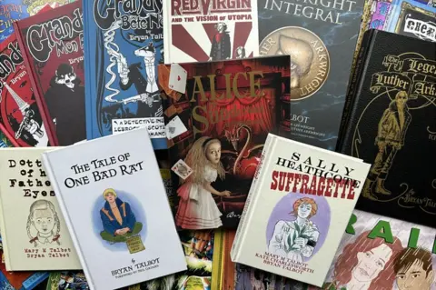 BBC An array of books spread out on a table