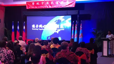Taipei Trade Office Participants watch a film at the Taiwan National Day event in Fiji on 8 October 2020 (picture from the Taipei Trade Office in Fiji website)