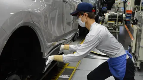 Toyota Toyota worker at assembly plant in Japan.