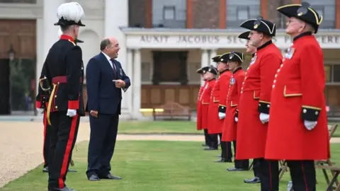 PA Media Defence Secretary Ben Wallace met Chelsea Pensioners during his visit to the Royal Hospital Chelsea