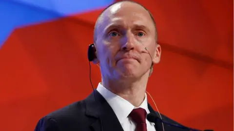 Reuters Carter Page addresses the audience during a presentation in Moscow, Russia, 12 December 2016