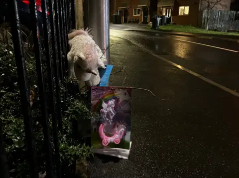 BBC Tributes left at the scene by neighbours