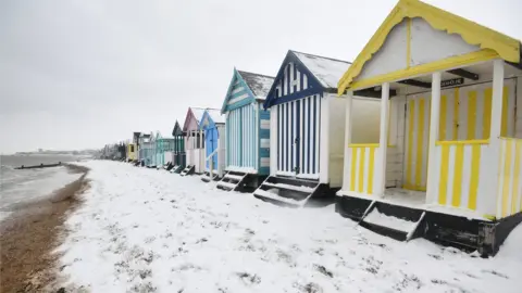 Victoria Jones/PA Wire Snow on beach at Thorpe Bay, Essex