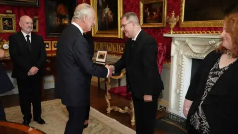 Reuters Alex Maskey, King Charles, Jeffrey Donaldson and Naomi Long