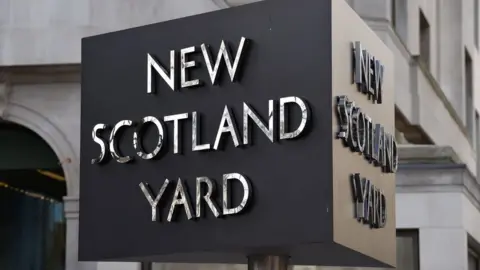 PA Media New Scotland yard sign