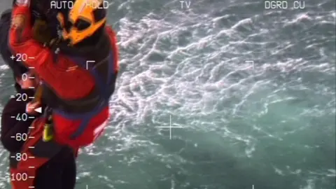 KATE BURROWS Kate being winched