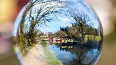 Julie Morgan  Goytre Wharf, taken through a globe