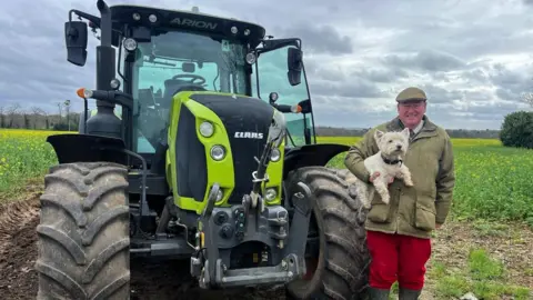 BBC/Lucy Vladev Colin Rayner next to tractor