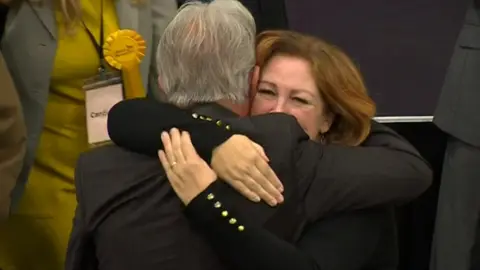 Lib Dem councillors hugging