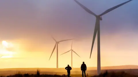 Getty Images Wind turbines