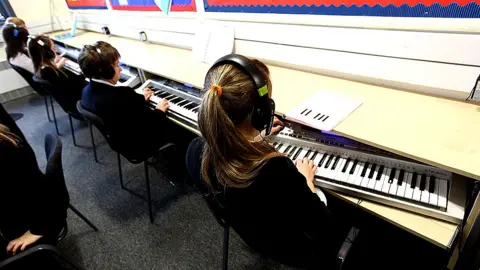 Getty Images Music lesson in school