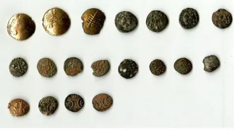 BRITISH MUSEUM’S PORTABLE ANTIQUITIES SCHEME The full hoard of 19 coins, the bottom four are the coins believed to have come from another area