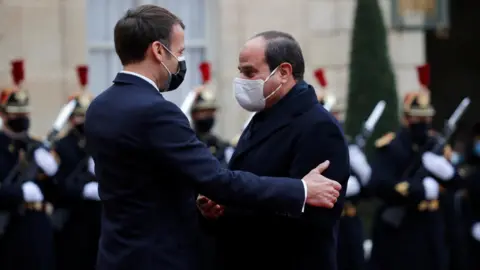 Reuters Emmanuel Macron welcomes Abdul Fattah al-Sisi at the Elysee Palace (7 December 2020)