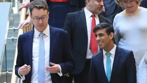 Simon Clarke and Rishi Sunak at the University of Leeds in March 2020