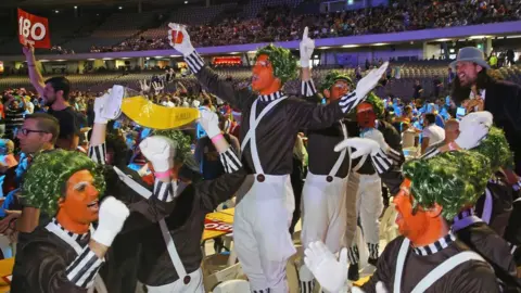 Getty Images Spectators in fancy dress at Invitational Darts Challenge in Melbourne, Australia in January 2015