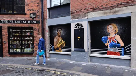 Pacemaker A new mural was painted in Belfast last month depicting Liz Truss and leadership rival Rishi Sunak