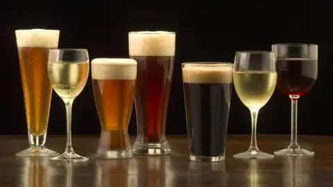 Getty Images/Mark Wagoner Productions An assortment of wine and beers