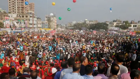 AFP Crowd of protesters in Dhaka