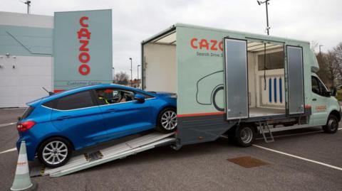 Car being loaded on to a Cazoo van