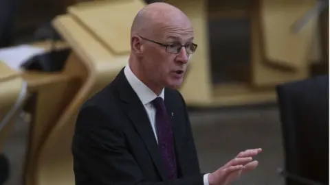 PA Media john swinney