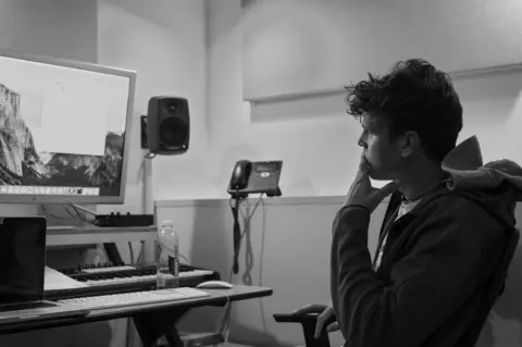 Martyn Ewoma Kamakaze in a studio