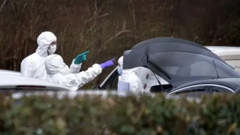 Google Forensics officers at John Caldwell's car the day after he was shot