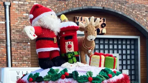 ITV/Coronation Street Syston Knitting Banxy's postbox topper on Coronation Street set