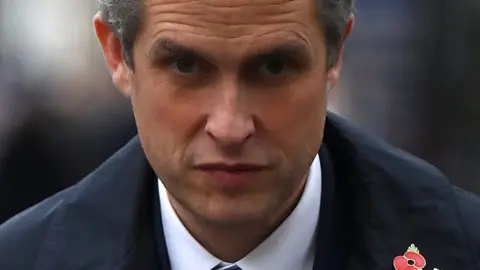 Reuters Gavin Williamson stares straight ahead in this close-up, head-on photo