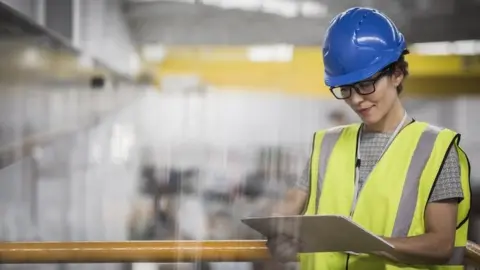 Getty Images Factory worker