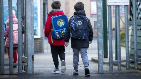 Jane Barlow pupils arriving at school