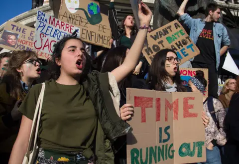 Getty Images Climate protesters in Paris, 16 Mar 19