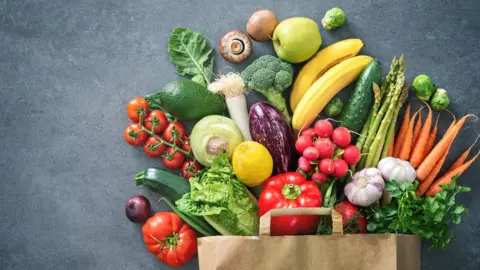 Getty Images Shopping bag of fruit and veg