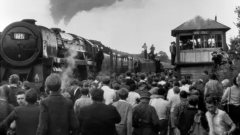 PA People getting a view of a steam train