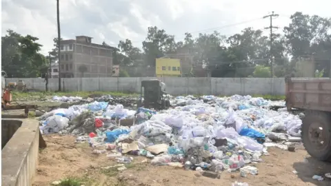 Getty Images PPE kits dumped in the open at Nalanda Medical College and Hospital campus -- designated Covid-19 hospital, on July 22, 2020 in Patna, India