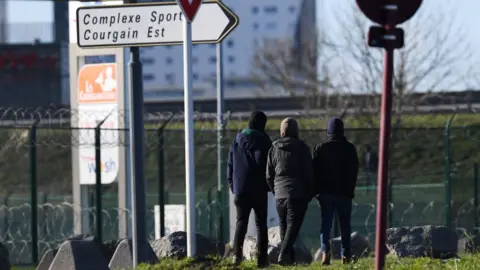 Getty Images Picture of migrants in Calais