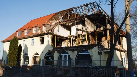 Getty Images Ruins of cell's Zwickau home, 13 Nov 11