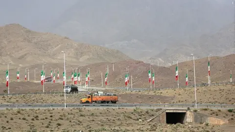 Getty Images Iranian flags along a highway in Natanz (file photo)