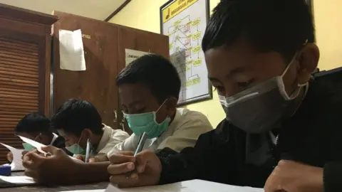 BBC/Haryo Bali students wearing face masks