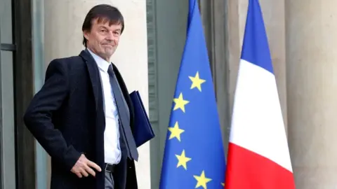 Reuters French Minister of the Ecological and Social Transition Nicolas Hulot leaves the Elysee Palace following the weekly cabinet meeting in Paris on 8 February 2018