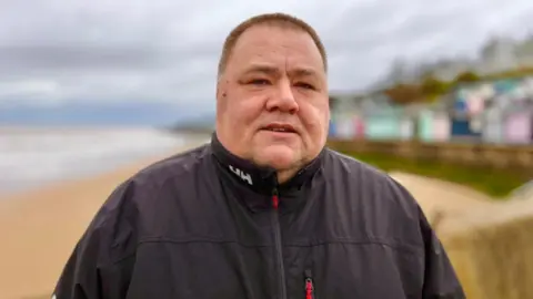 Martin Giles/BBC Stewart Oxley, former operations manager at Walton RNLI