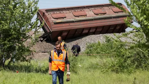 Reuters A derailed train carriage near Simferopol in the Russia-annexed Crimea. Photo: 18 May 2023