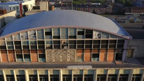 Ships in the Sky the Fish mural exposed