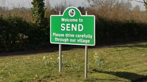 A Google Street map picture of a sign welcoming people to Send.