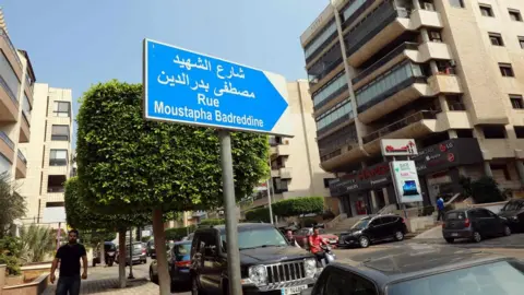 AFP A sign on Martyr Mustafa Badreddine street in southern Beirut (18 September 2018)